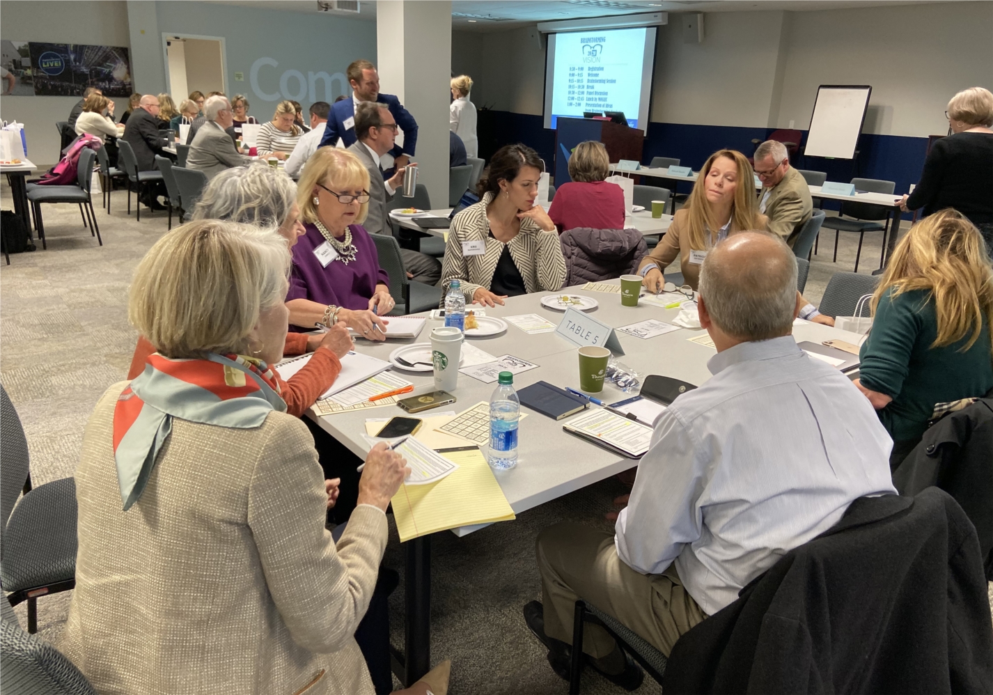 Agents in a brainstorming session at a business plan meeting