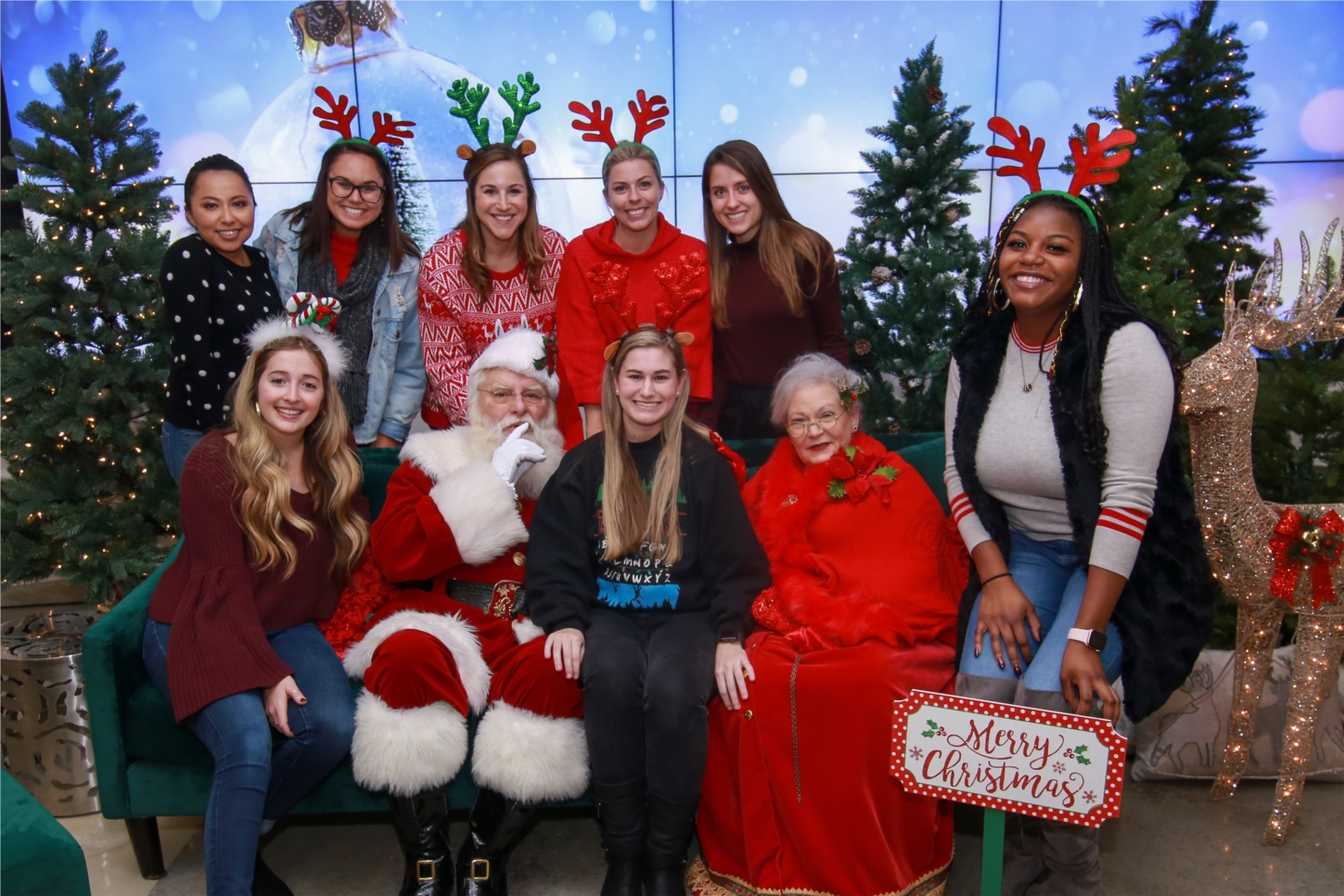 YAH employees enjoy our annual holiday party with Santa & Mrs. Claus.