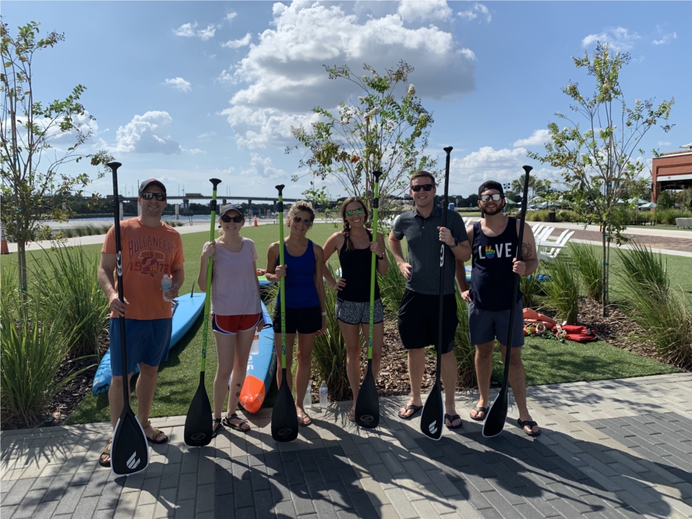 Beck Wellness committee planned a fun day paddleboarding for employees!