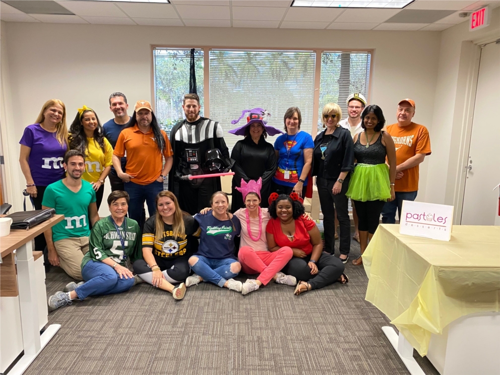Some of our Playa team members posing with their Halloween costumes minutes from the Annual Halloween Costume Contest. 