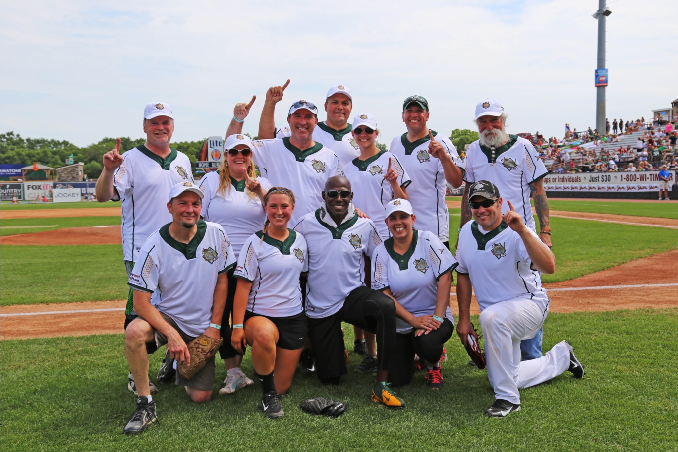 Hupy and Abraham Employees with Donald Driver at Charity Softball game