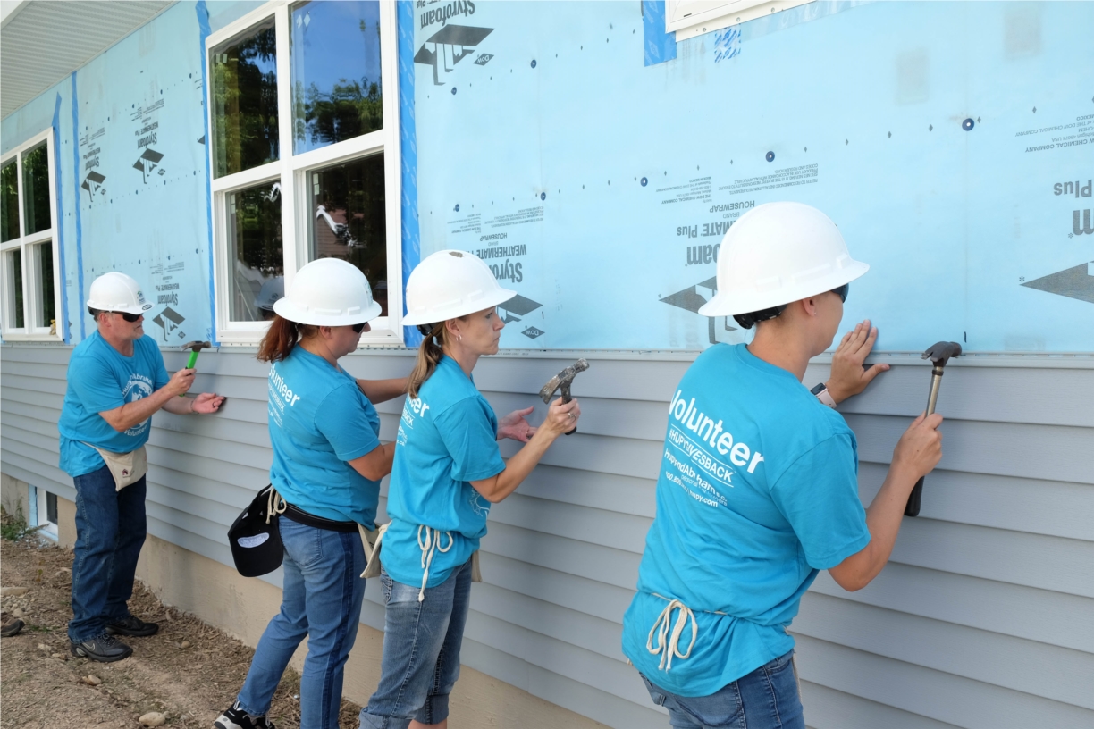 Hupy and Abraham employees volunteering at Habitat for Humanity home.