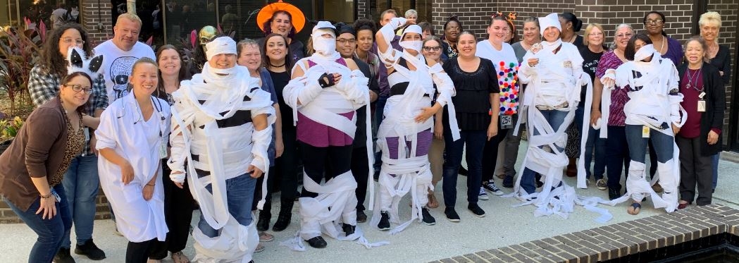 Billing gets into the Halloween spirit with fellow team "mummies"