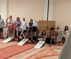 ScottMadden’s annual meeting included a team building activity with solar car builds and races.