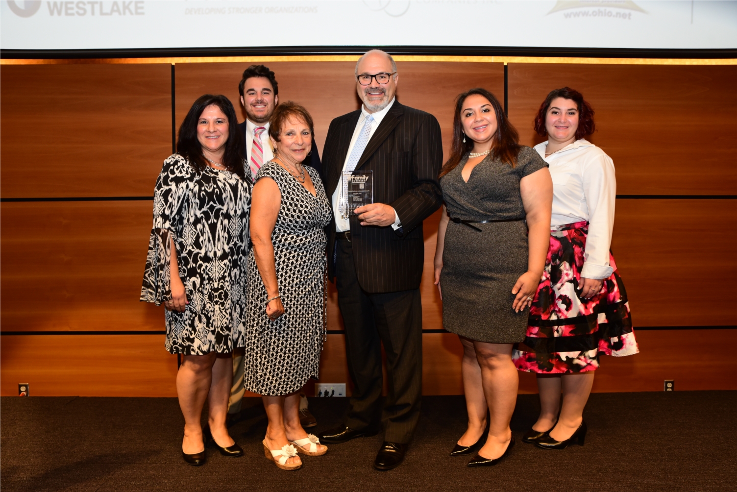 Amotec accepts the Family Business Honoree Award from Smart Business Magazine
