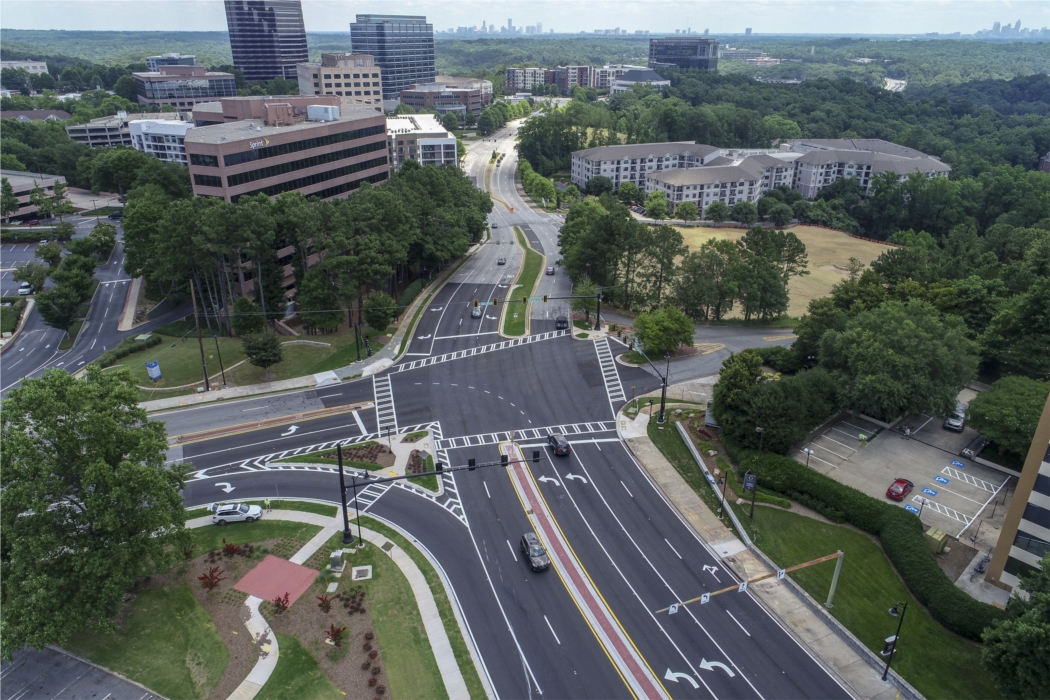 Celebrating Three ACEC Georgia Awards: Arcadis received the Grand Prize Award, the Design-Build Project Award, and the NEPA/Environmental Protection/Preservation/Restoration/Enhancement Award. Pictured here: our Grand Prize Award winner, the Cumberland Boulevard Widening Project.