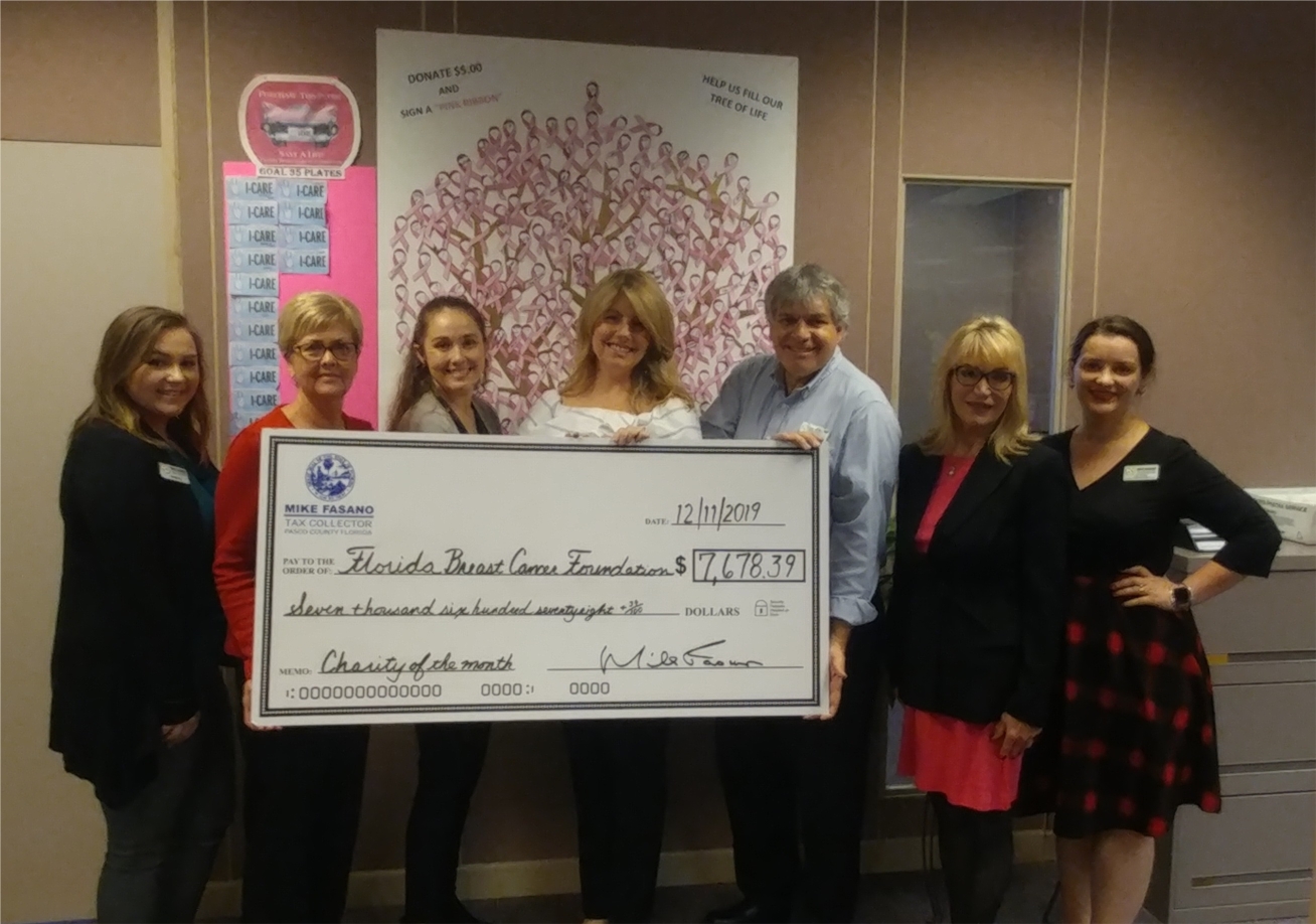 Every October the Pasco County Tax Collector's Office features the Florida Breast Cancer Foundation as part of its Charity of the Month program. This photo is staff of the office presenting a check to representatives of the Foundation.