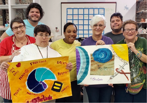 Caracole staff are actively involved in the community, supporting important advocacy and social justice efforts as well as volunteering time to support other human, health and social services partners and causes, like Visionaries + Voices, pictured here.
