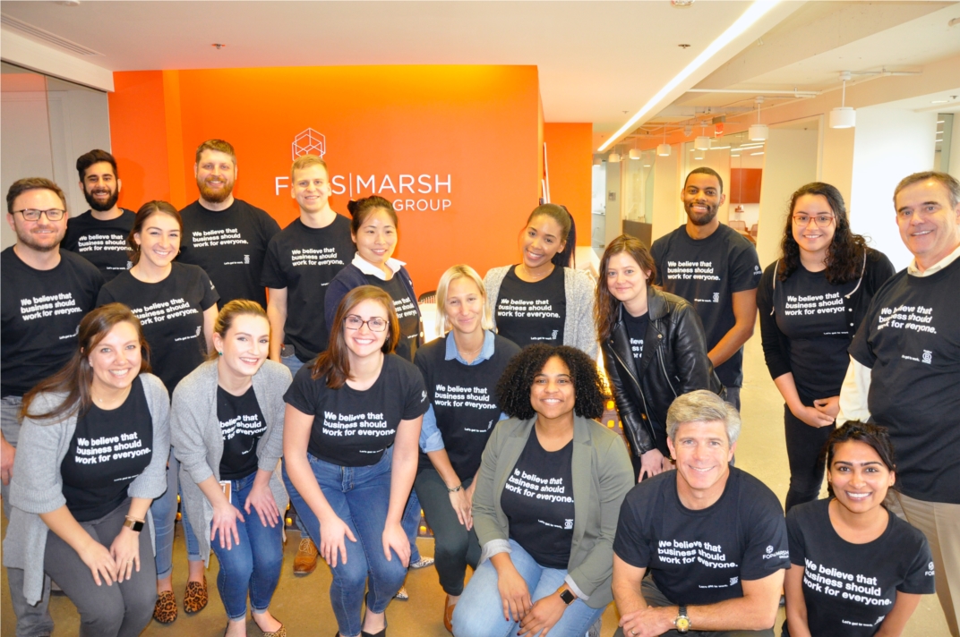 FMG staff in their B Corporation t-shirts celebrating FMG's anniversary of becoming a B Corporation. As a Certified B Corporation, FMG is committed to a higher standard of business practice that creates a positive impact on our community, employees, clients, and the environment.