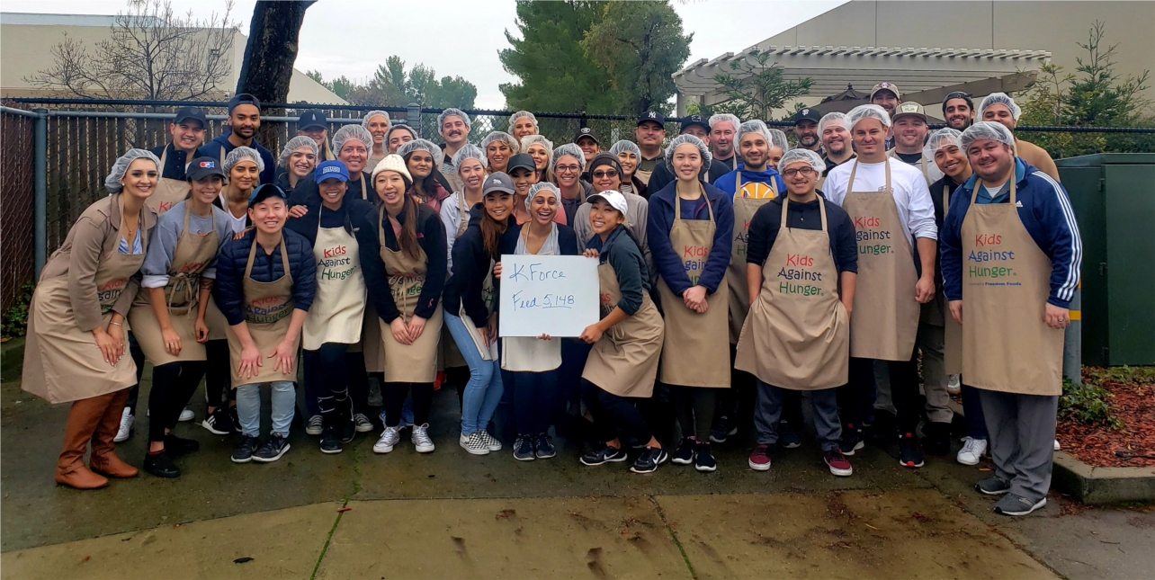 Kforce gives back to the local community on its annual Day of Giving. This team spent their work day packaging meals for the Kids Against Hunger organization. 