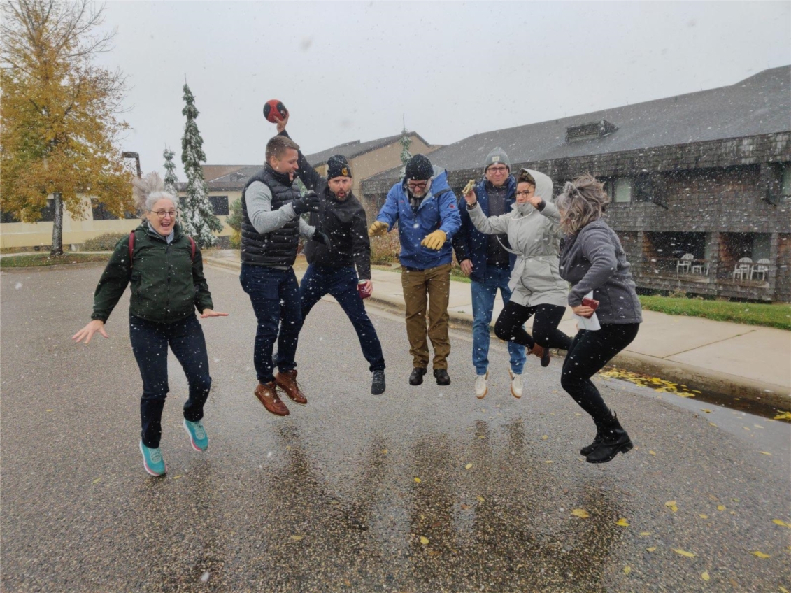We have fun together on our annual team building retreat (even when it snows it October!) 