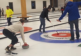 Nova's HQ team likes to work hard and play hard by participating in the Chaska Curling Center's Corporate Curl League.