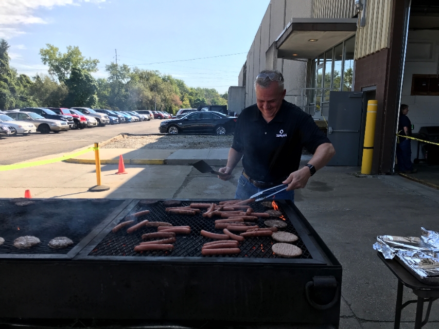 The organization's President and Grill Master, Dale Bissonette, treating the SDMyers family to a classic Summer feast.
