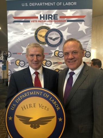 ASM Research President, John Fraser and Vice President, Carl Johnson receive the U.S. Department of Labor Honoring Investments in Recruiting and Employing American Military Veterans (HIRE Vets) gold medallion signifying exemplary efforts to recruit, employ, and retain United States veterans. This is the only federal-level veteran hiring award.