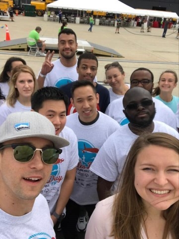 ASM Research employees participate in the 2019 Dulles Day Festival and Plane Pull. ASM is a sponsor for this event which raises money for Special Olympics athletes. 