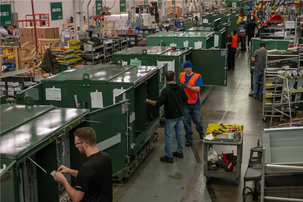 S&C team members assembling switchgear. *Photo taken prior to COVID-19 and related safety guidelines.