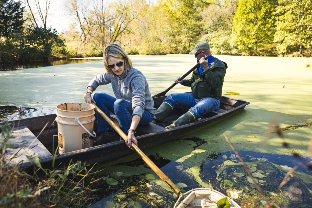 Mt. Cuba Center staff working in on the pond. 