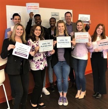 A few of our Dallas office employees highlighting 2020's IWD theme, #EACHFOREQUAL