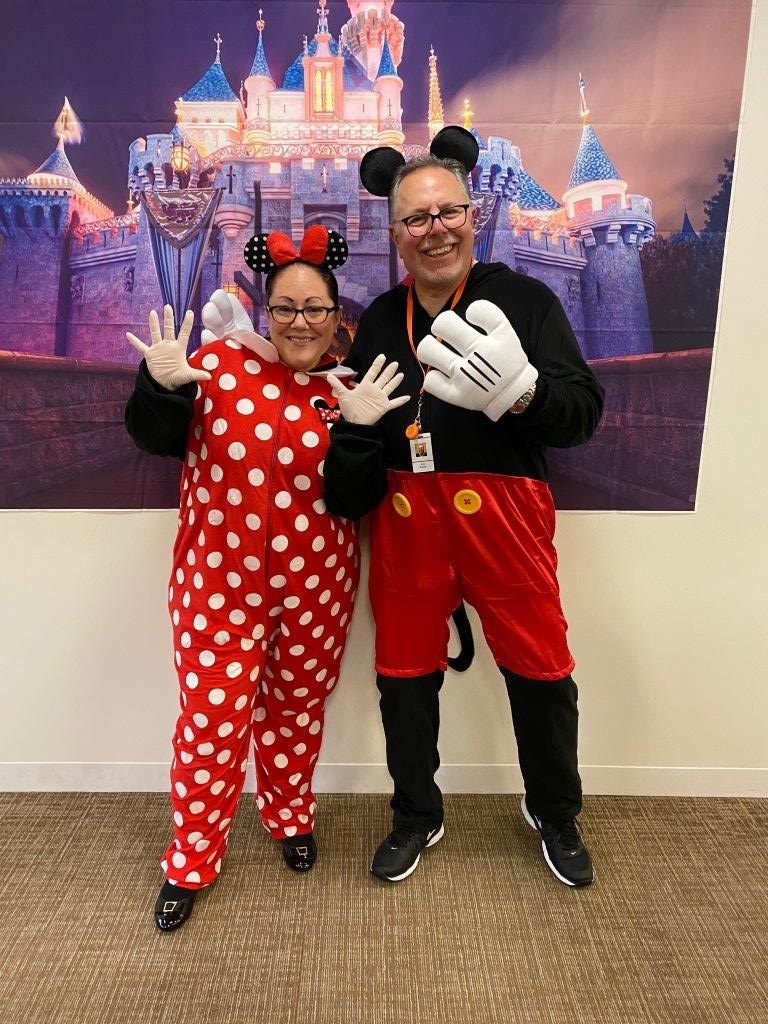 Our SVP and VP of Revenue Cycle Management winning the hearts of team members during our Halloween event.