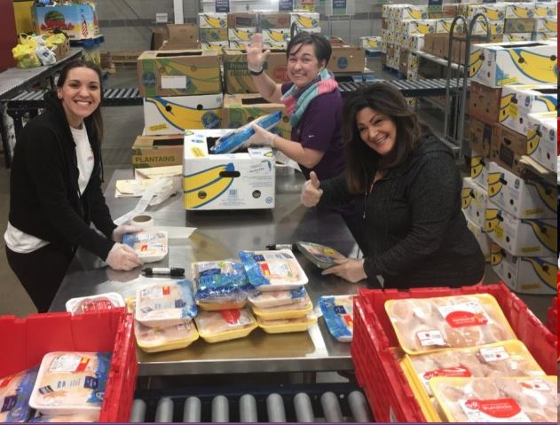 FoodShare – 3.9.19 
A few of the many volunteers that helped a local food bank, FoodShare, to unbox and shelf over 6,700 packages of meat to combat food insecurity for families in Hartford.
