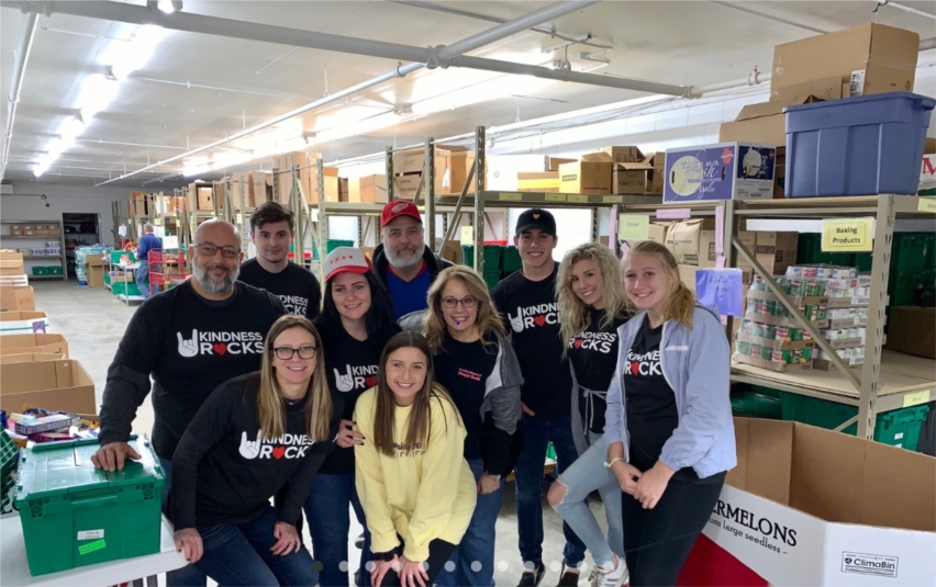 Lou Malnati's team members volunteer at Crystal Lake Food Pantry in support of Kindness Rocks, Lou Malnati's charitable giving program