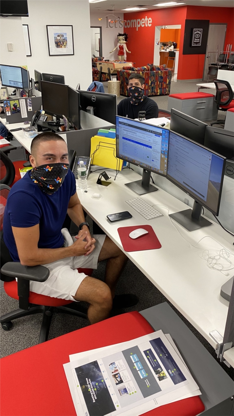 Paid Search Strategist Michael Funcheon (left) and Sr. Paid Search Strategist Nick Gaffney are part of one team of employees who returned to the AW office after the pandemic lockdown restrictions were eased in July 2020. 