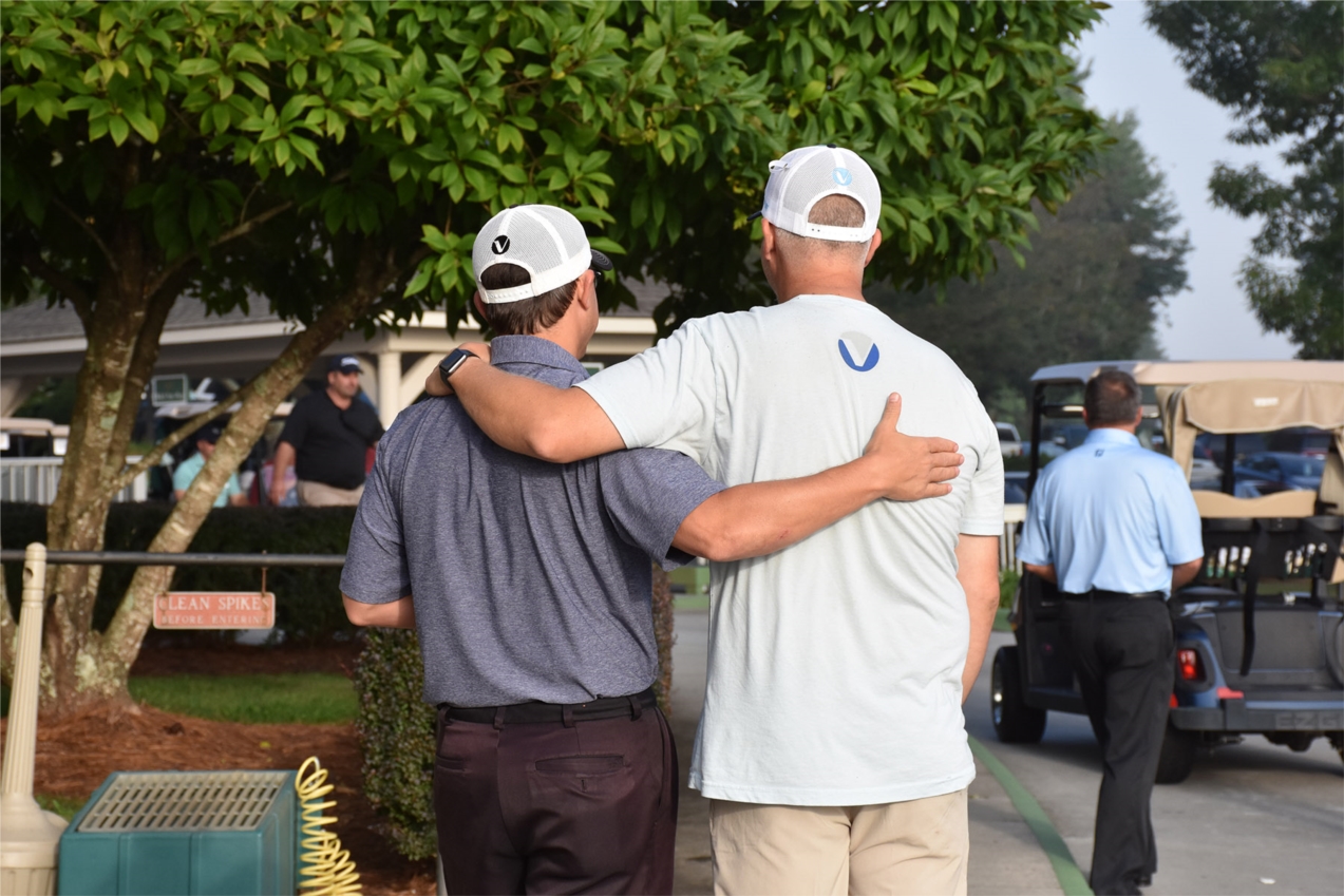 Employee camaraderie at the Annual Jeremy Elliott Charity Golf Tournament.