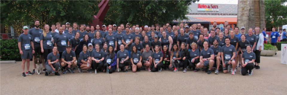 Merit employees exercise and socialize while participating in the Dallas Corporate 5K.