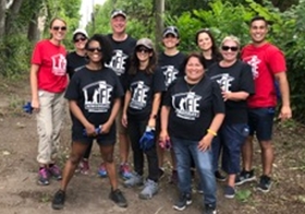 A group of employees use their Volunteer Time Off to participate in Life Remodeled. This year they spent time cleaning up blight in some neighborhoods of downtown Detroit. 