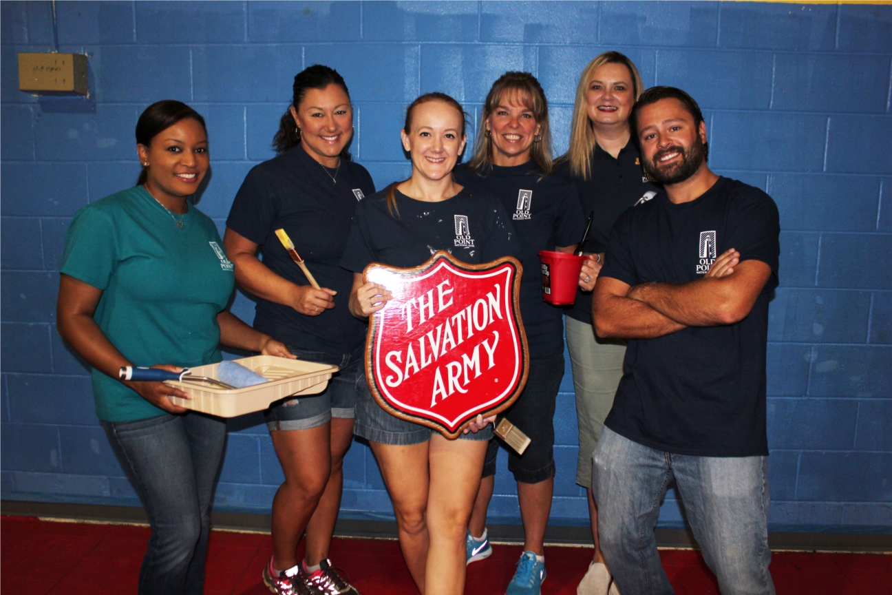 Employees volunteer for the Salvation Army as part of the United Way's Day of Caring.