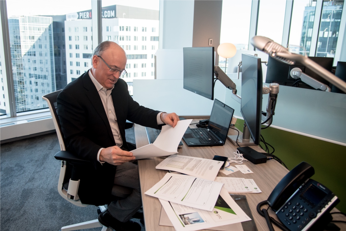 All employees enjoy open and unassigned workstations in our headquarters at 121 Seaport, even our President & CEO, Jim Heppelmann.