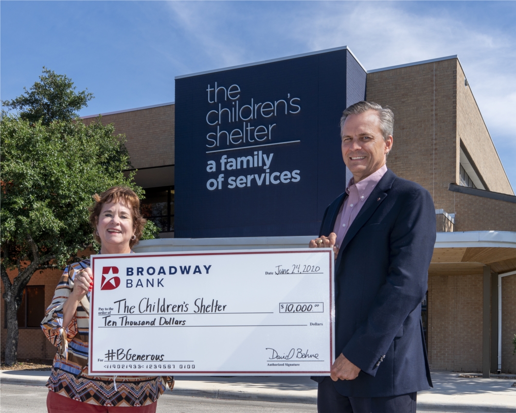 Broadway Bank CEO David Bohne presents a $10,000 check to The Children's Shelter as part of the #BGenerous donation campaign in May.  Broadway Bank helped raise a total of $35,000 in COVID-19 relief funds for the shelter. 