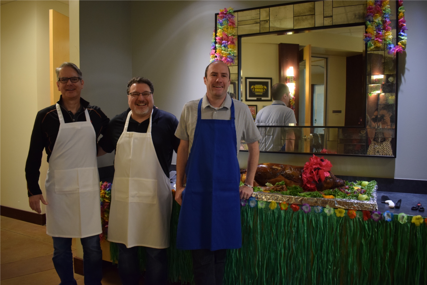 Pig Roast for employee appreciation day. Served by our executive team.