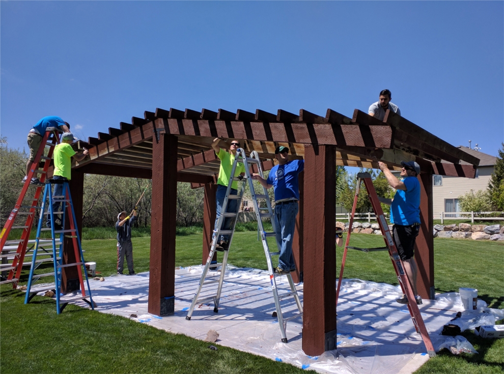 Xactware employees help paint and clean up the facilities at this Lehi City park as part of the company's annual Founders Week activities in May 2016.