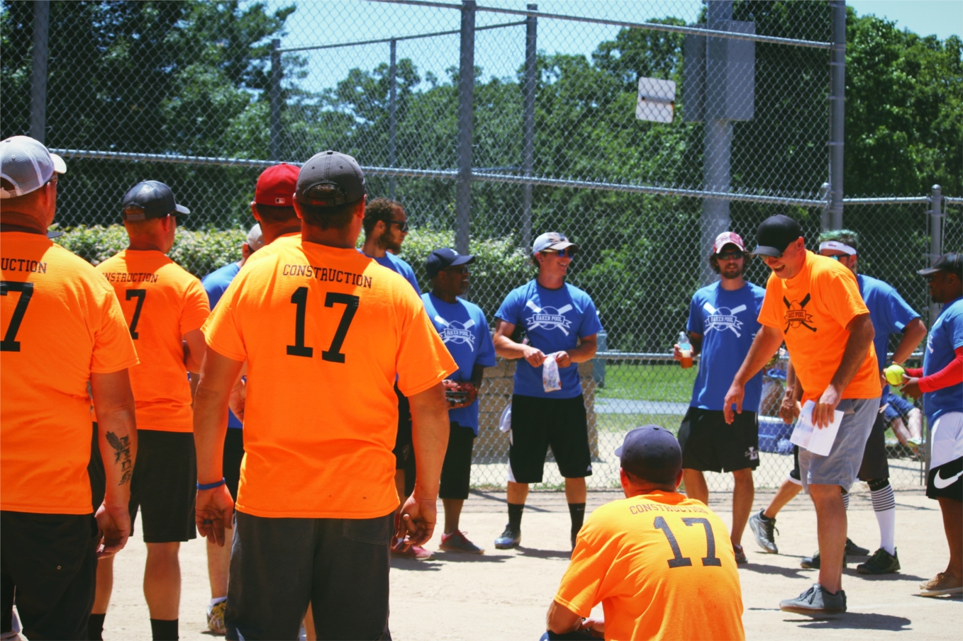 Enjoying a little friendly competition at the annual Baker softball game.