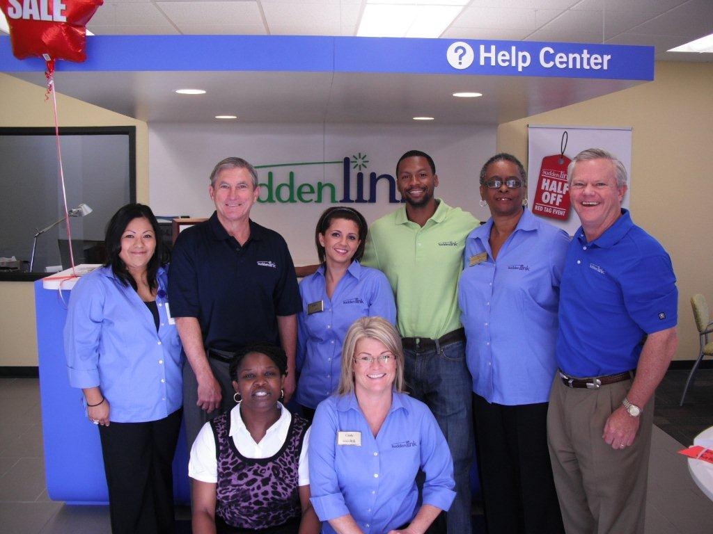 CEO Jerry Kent (left) and Chief Operating Officer Tom McMillin (right) recently joined the Suddenlink team in Nacogdoches, Texas, for the re-opening of a newly remodeled Suddenlink store.  Reflecting Suddenlink's emphasis on customer care, the company has been remodeling stores around the country to better serve its 1.4 million customers.