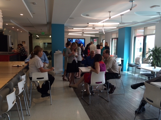 NEI employees gathering in the company café